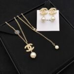 Chanel CC Pearl Gold Earrings - Image 2